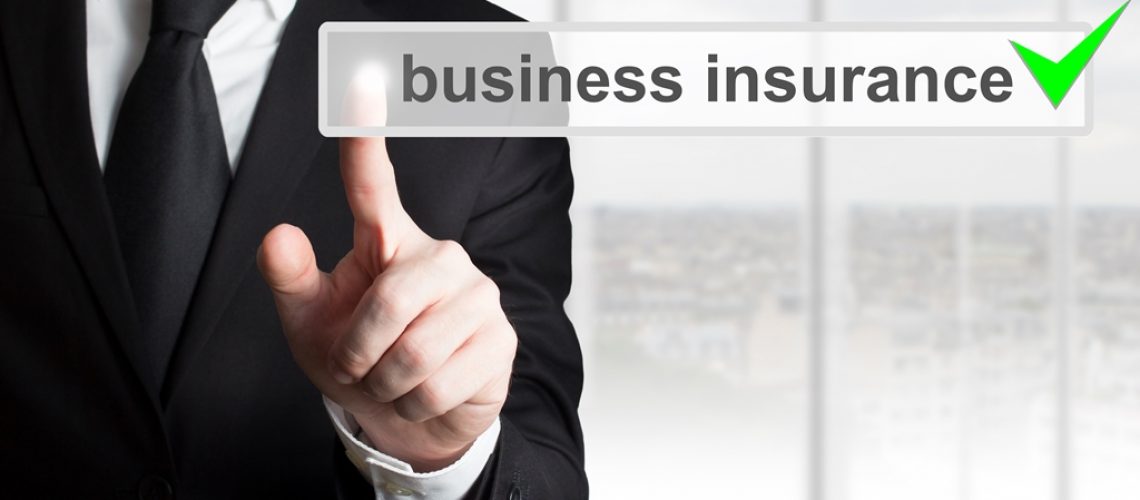 businessman pushing button business insurance